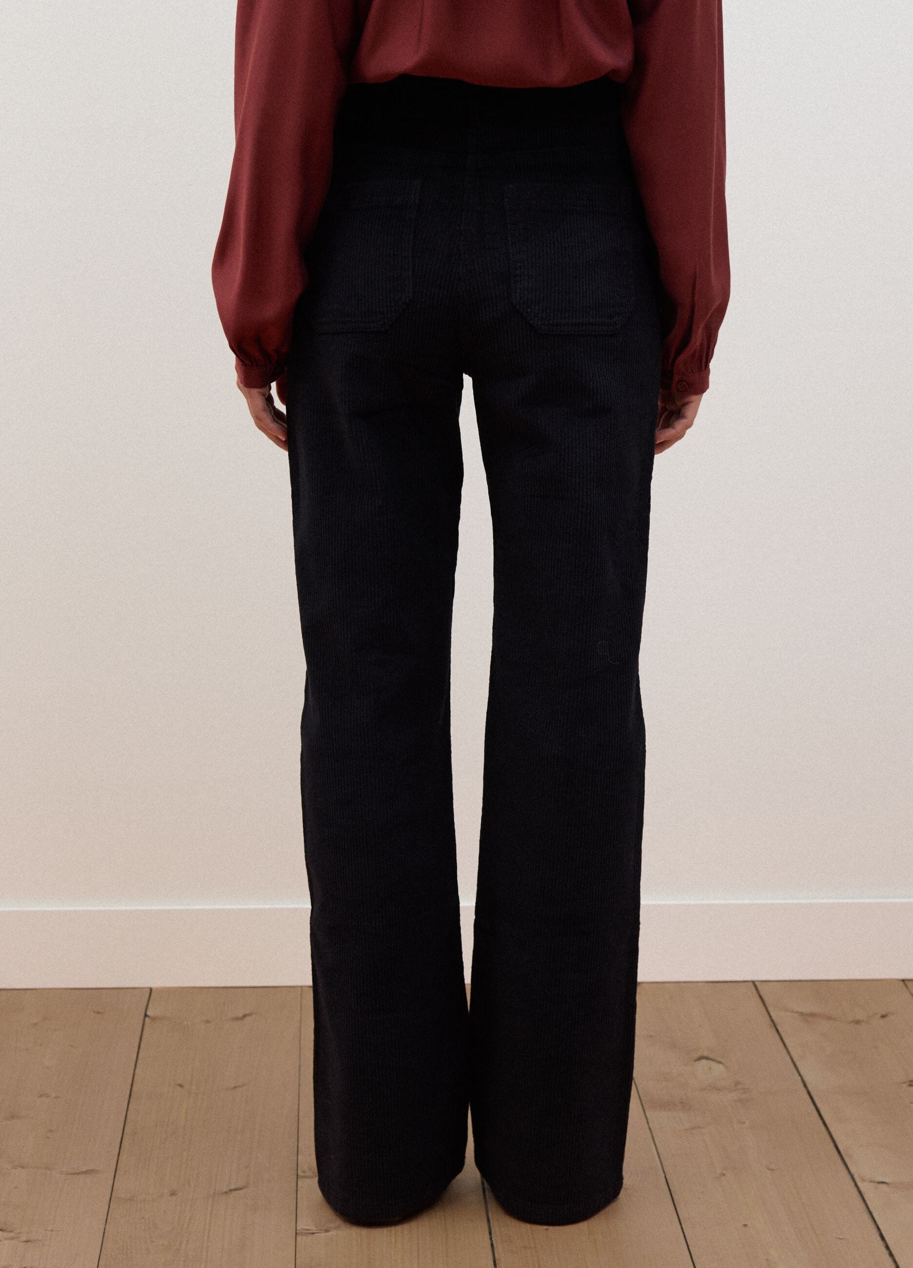 Black ribbed stretch-cotton flared trousers