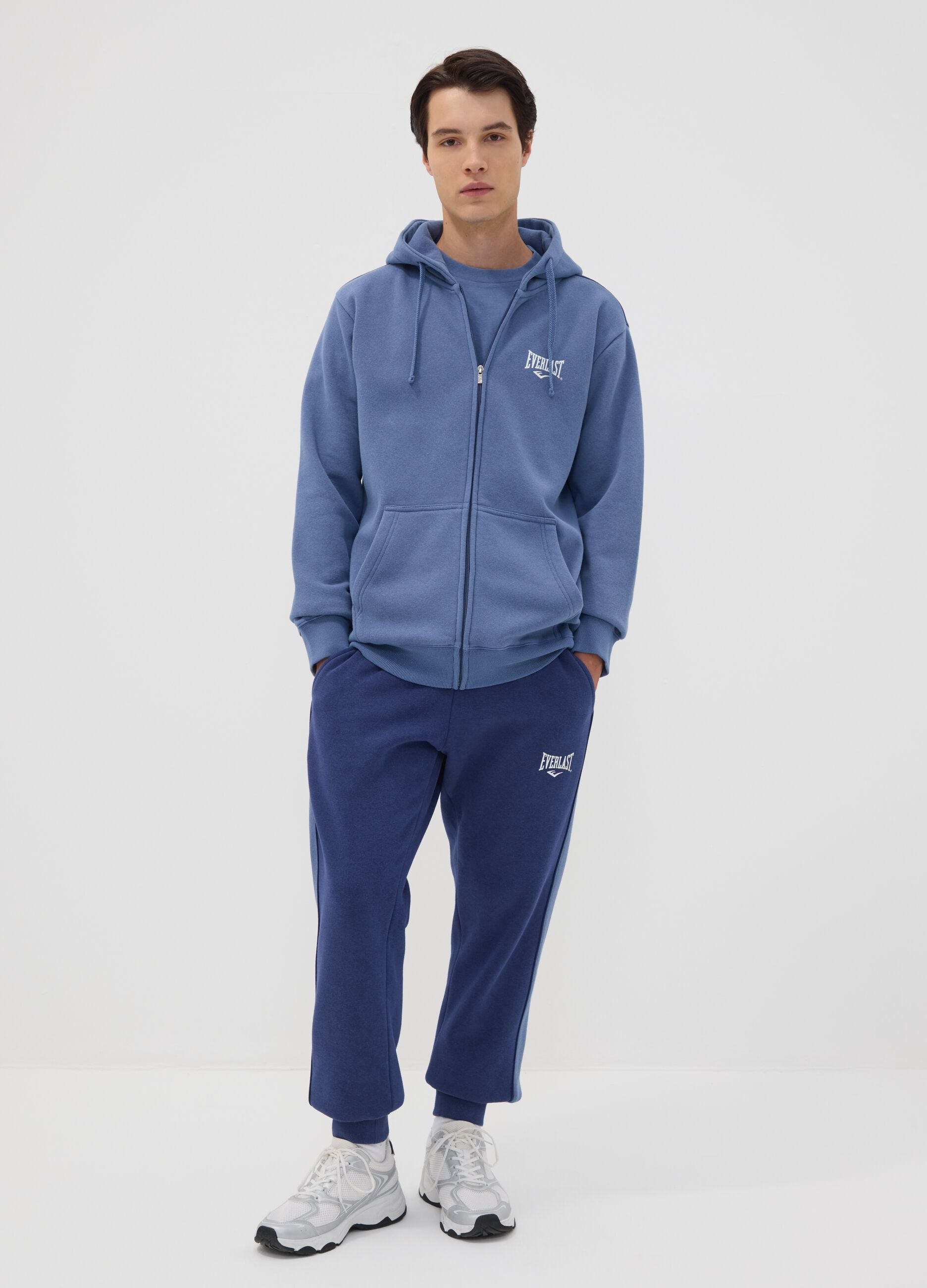 Blue cotton-blend joggers with print