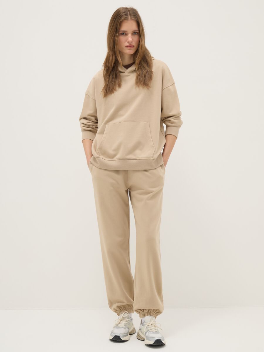 Beige cotton blend regular fit jogger trousers_0