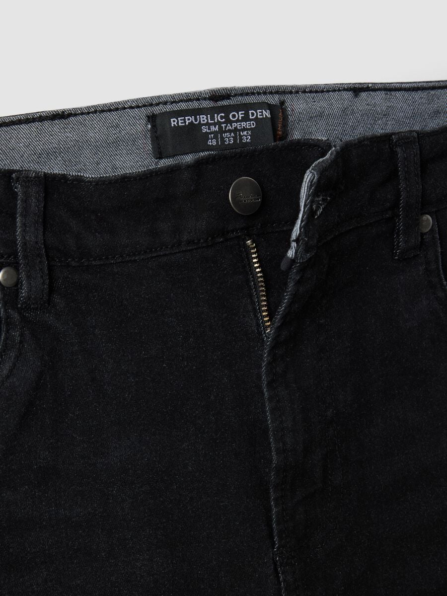 Jeans neri in cotone elasticizzato slim tapered fit_1