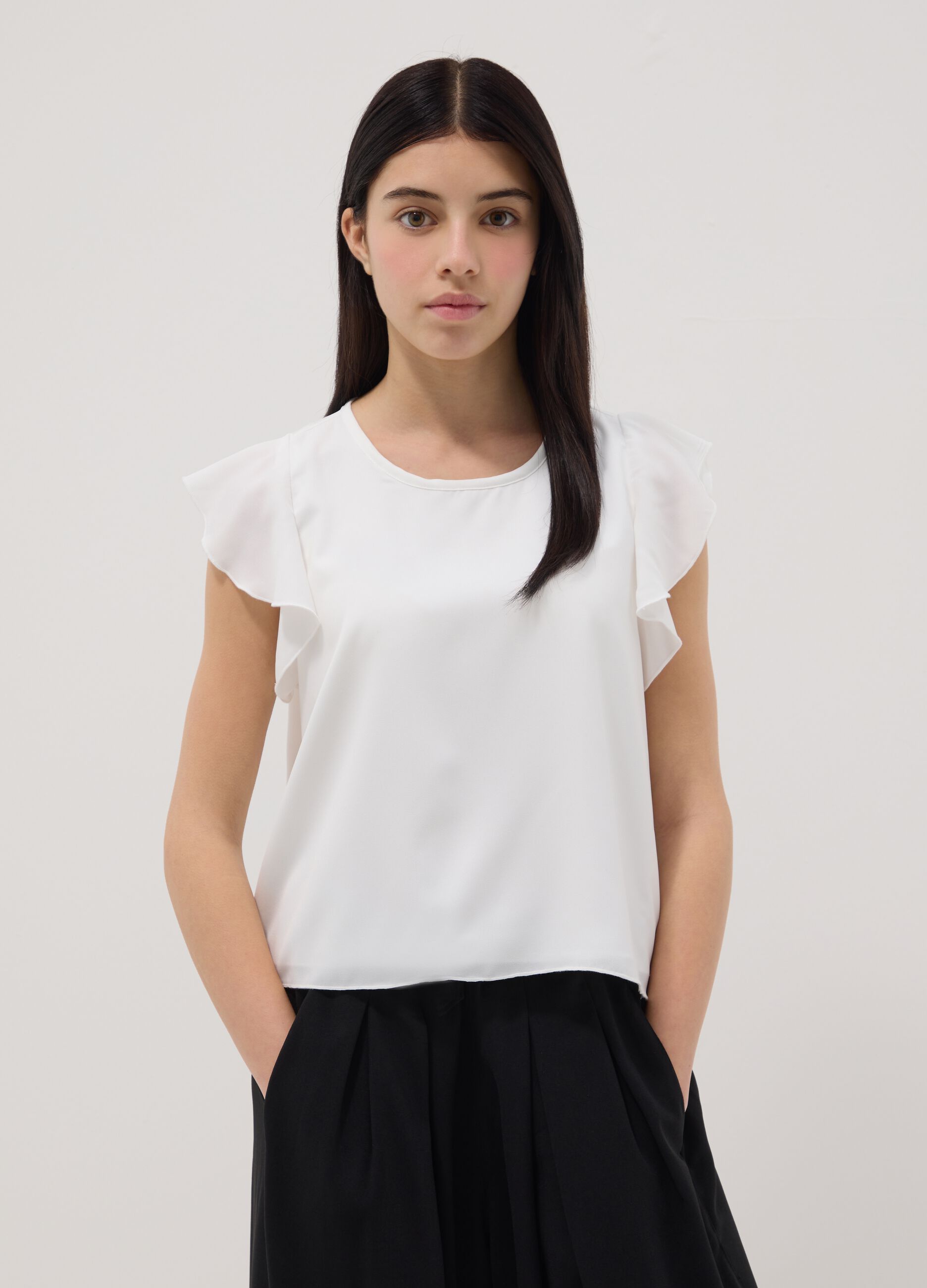 White regular fit girl's blouse with ruffled sleeves