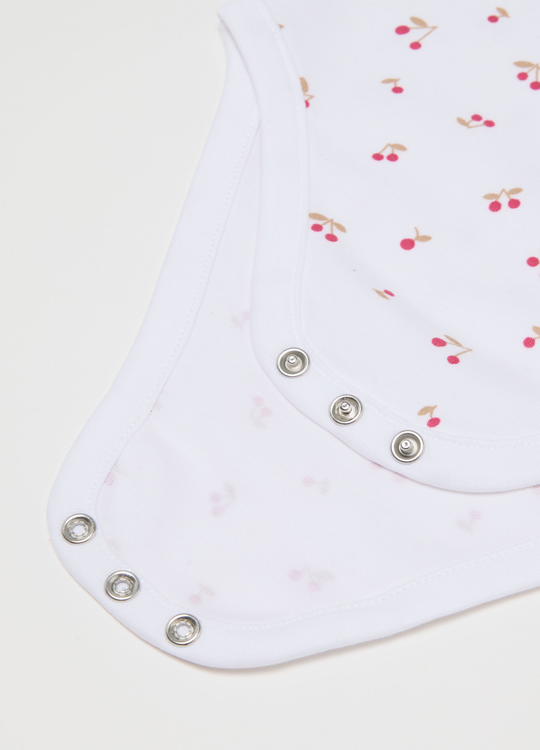 Set of two white pure cotton bodysuits for baby girls
