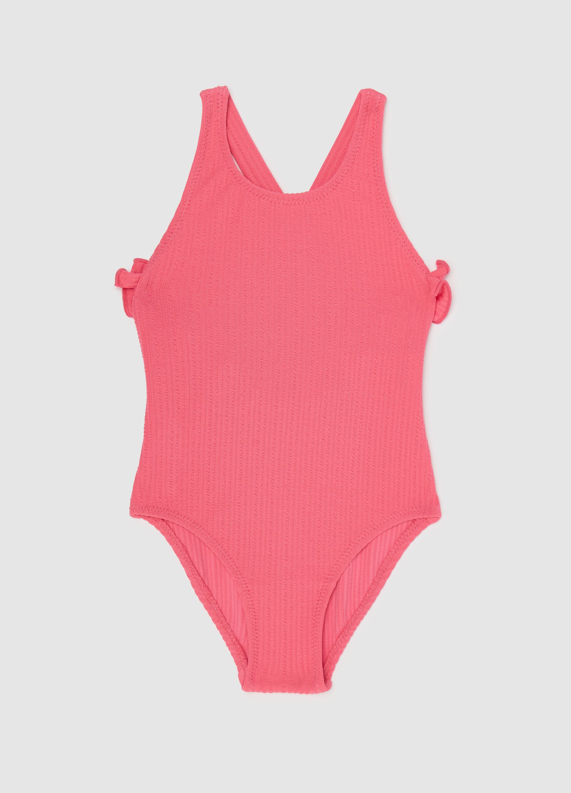 Pink One-Piece Swimsuit with Ruffled Details
