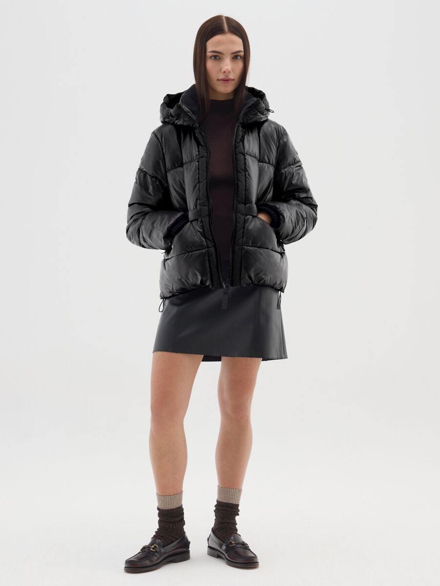 Piumino The Iconic Puffer nero con cappuccio_1