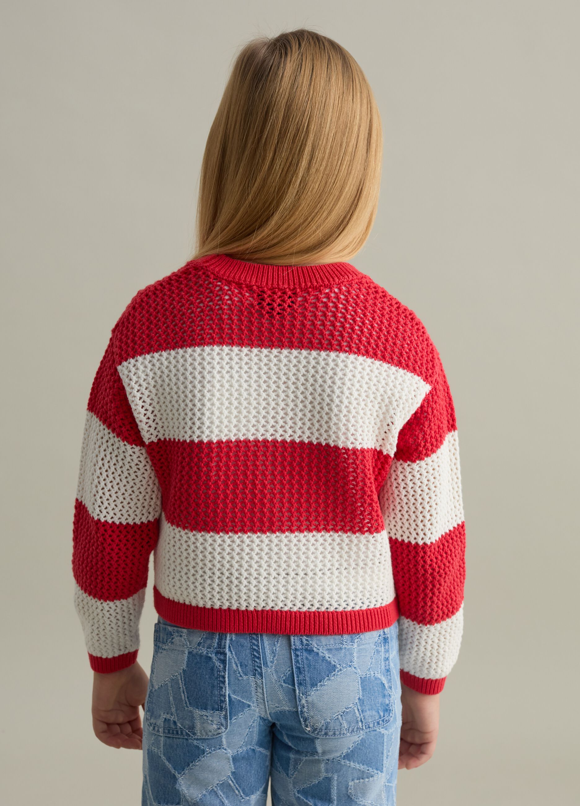 Pullover a righe con trama traforata 