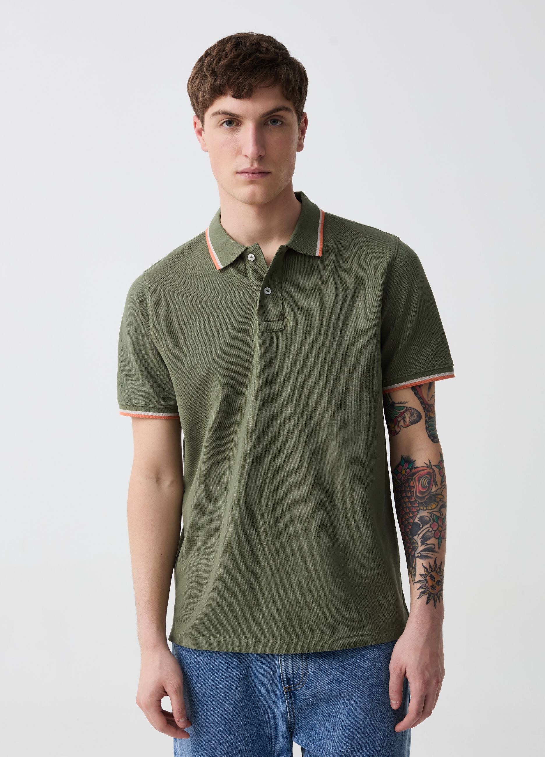 Polo shirt in piquet with striped edging