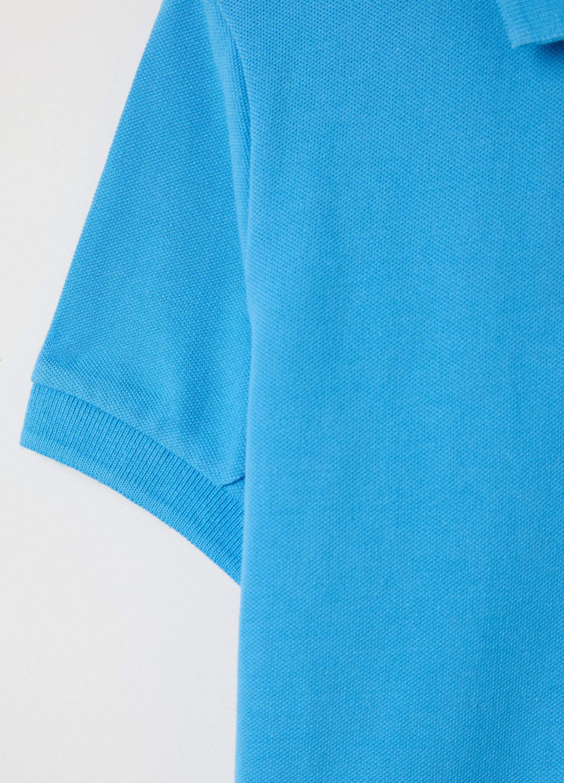 Essential light blue polo shirt in organic cotton