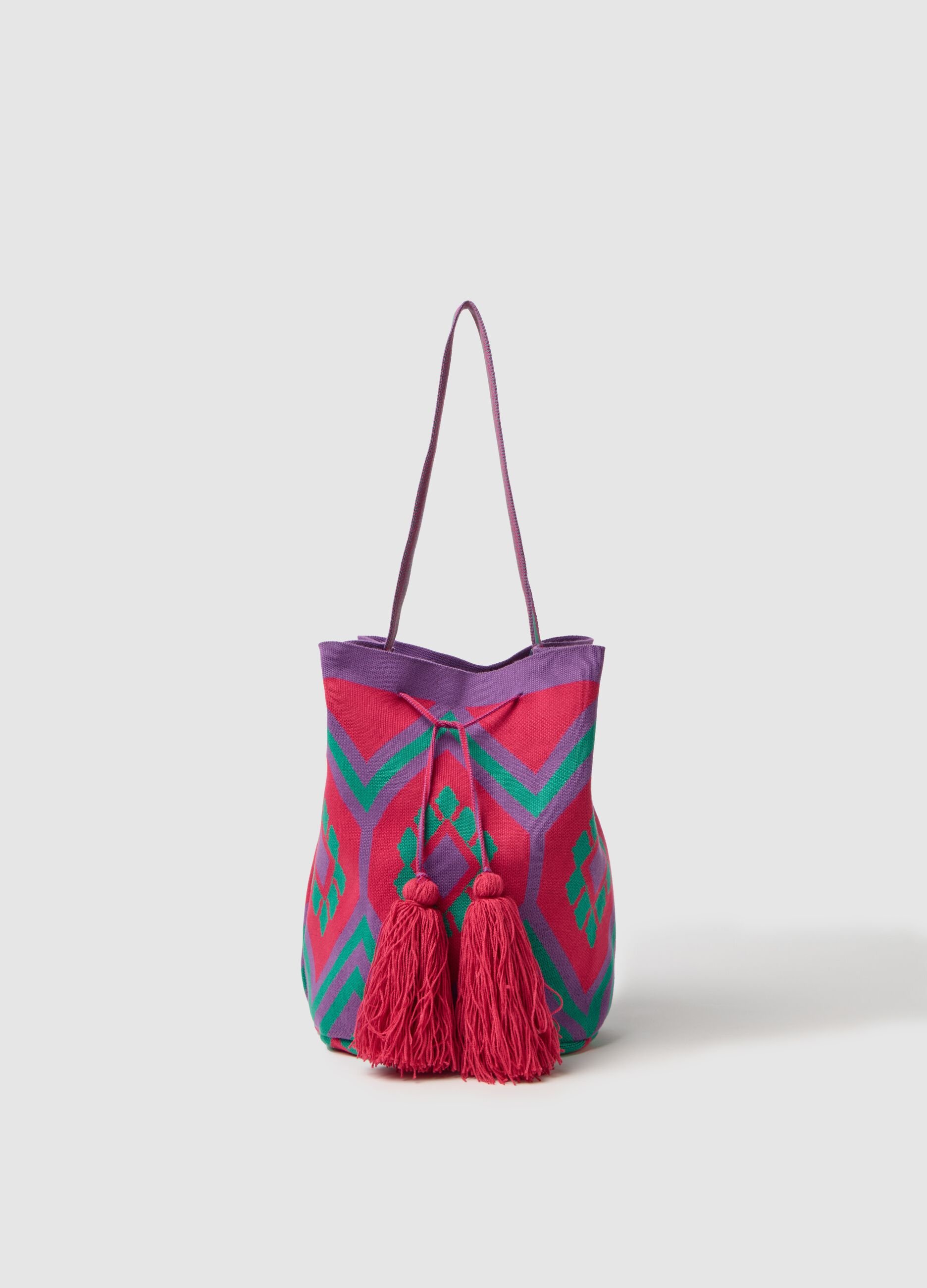 Shoulder bag with geometric motif and tassels