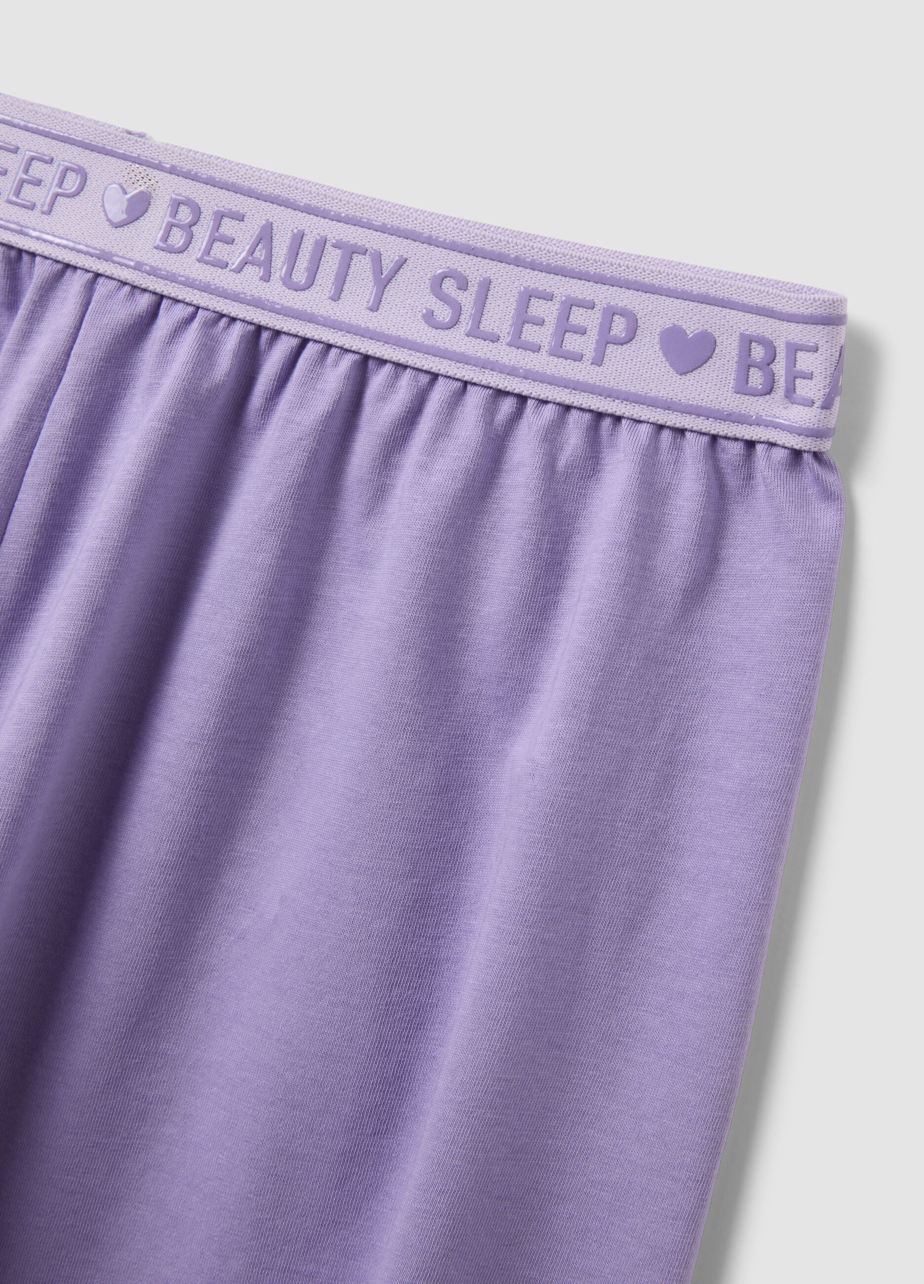 Girls&rsquo; purple short pyjamas in 100% organic cotton with slogan