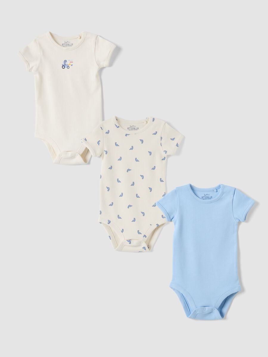 Tripack di body azzurri e bianchi in puro cotone organico con fantasia_0