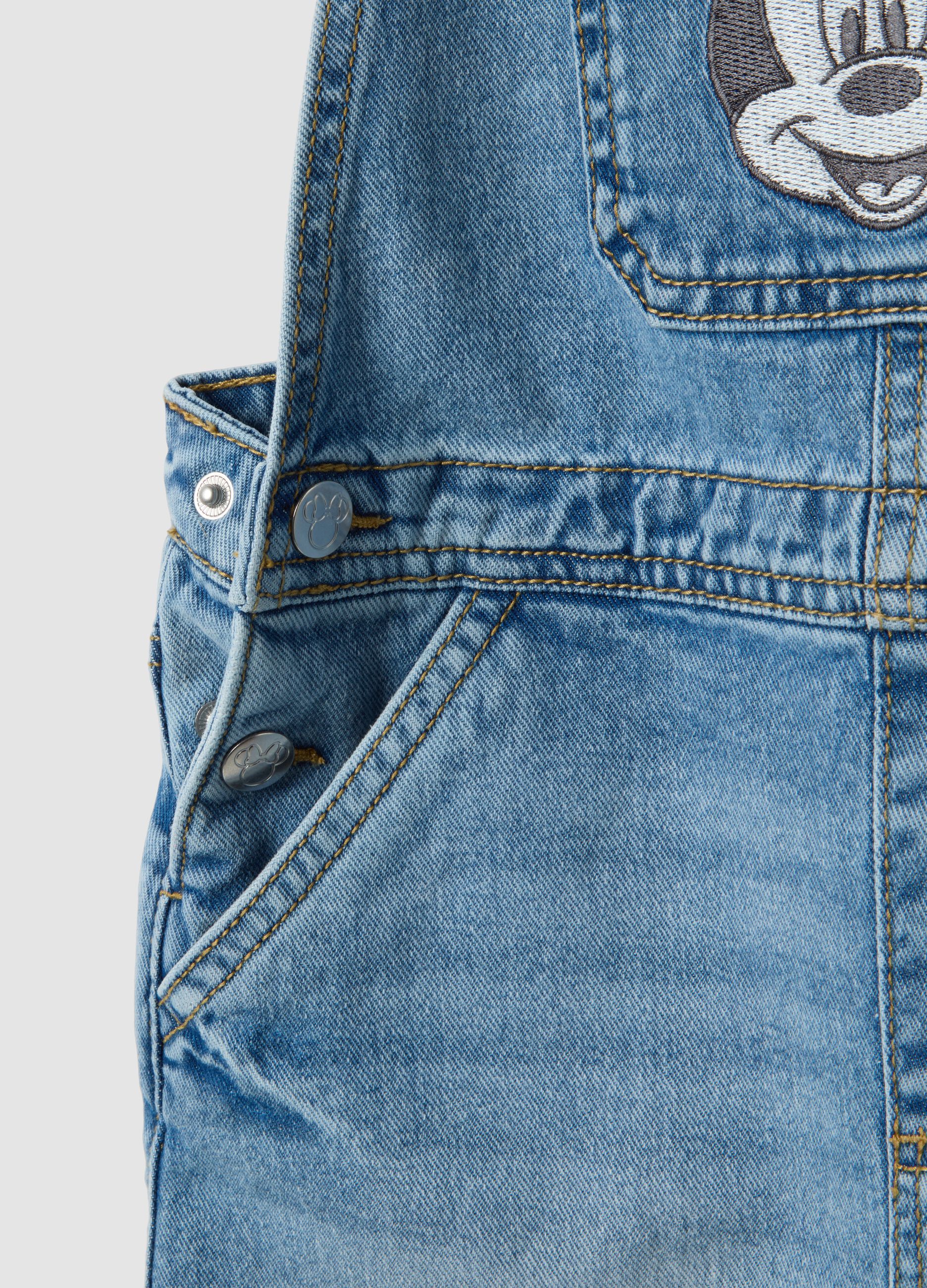 Girls&rsquo; blue denim dungarees in 100% cotton with Minnie embroidery