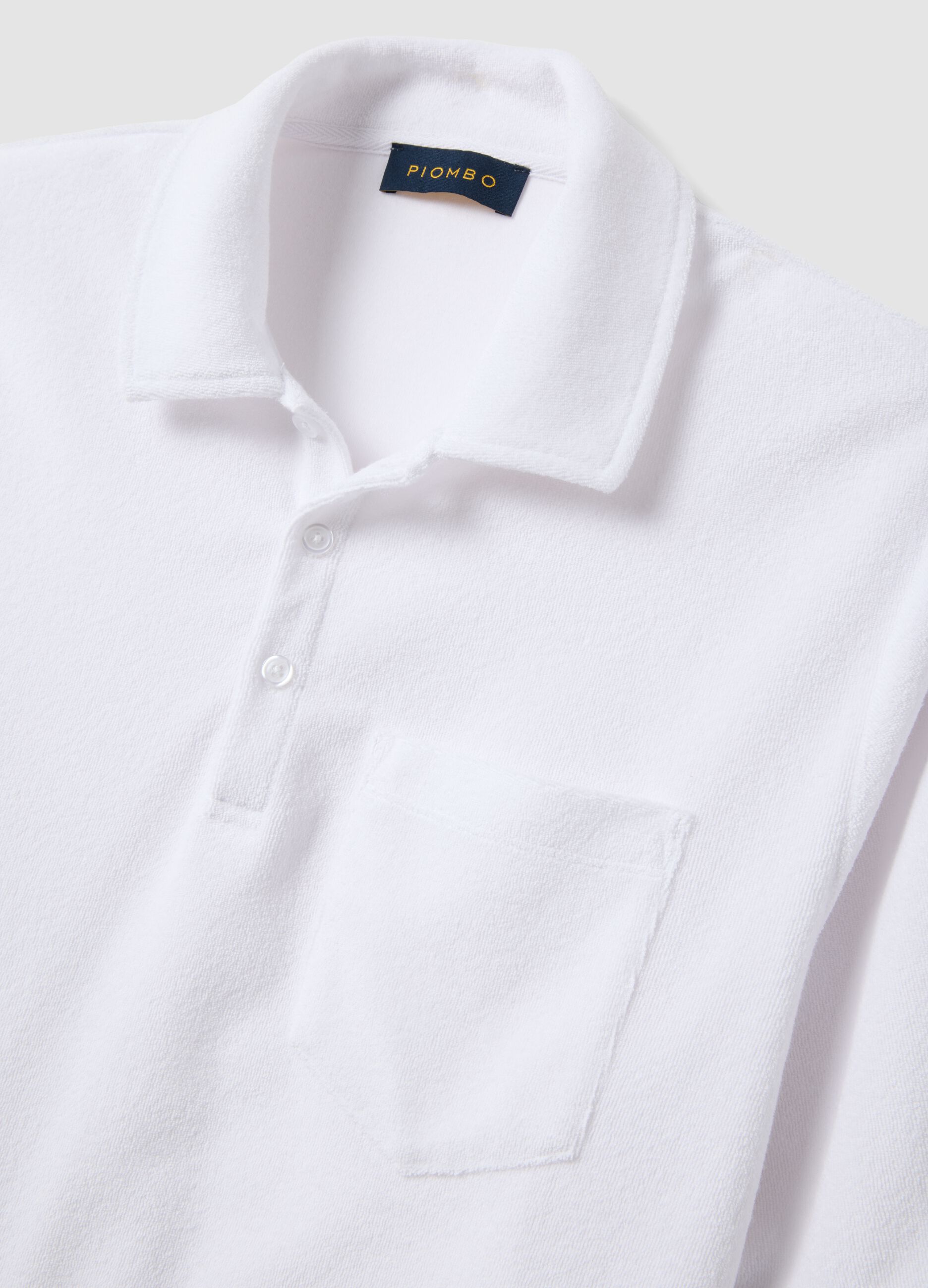 White cotton-blend polo shirt