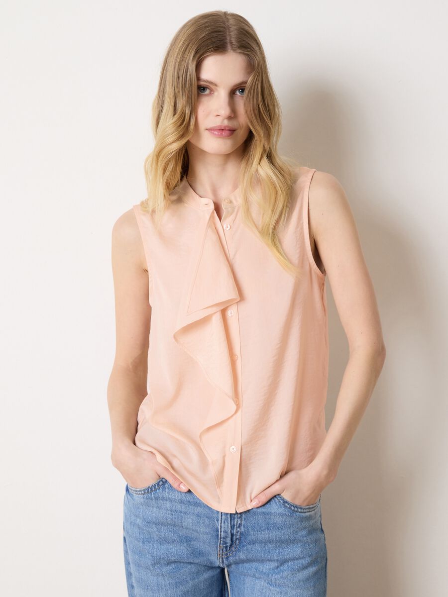 Pink sleeveless blouse with flounce_1
