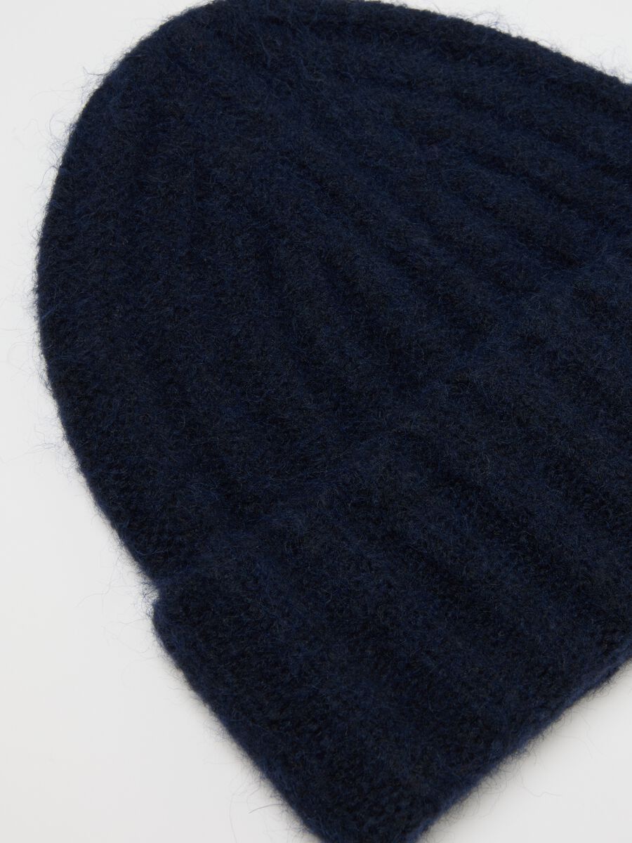 Berretto blu pesante in tessuto elasticizzato_1