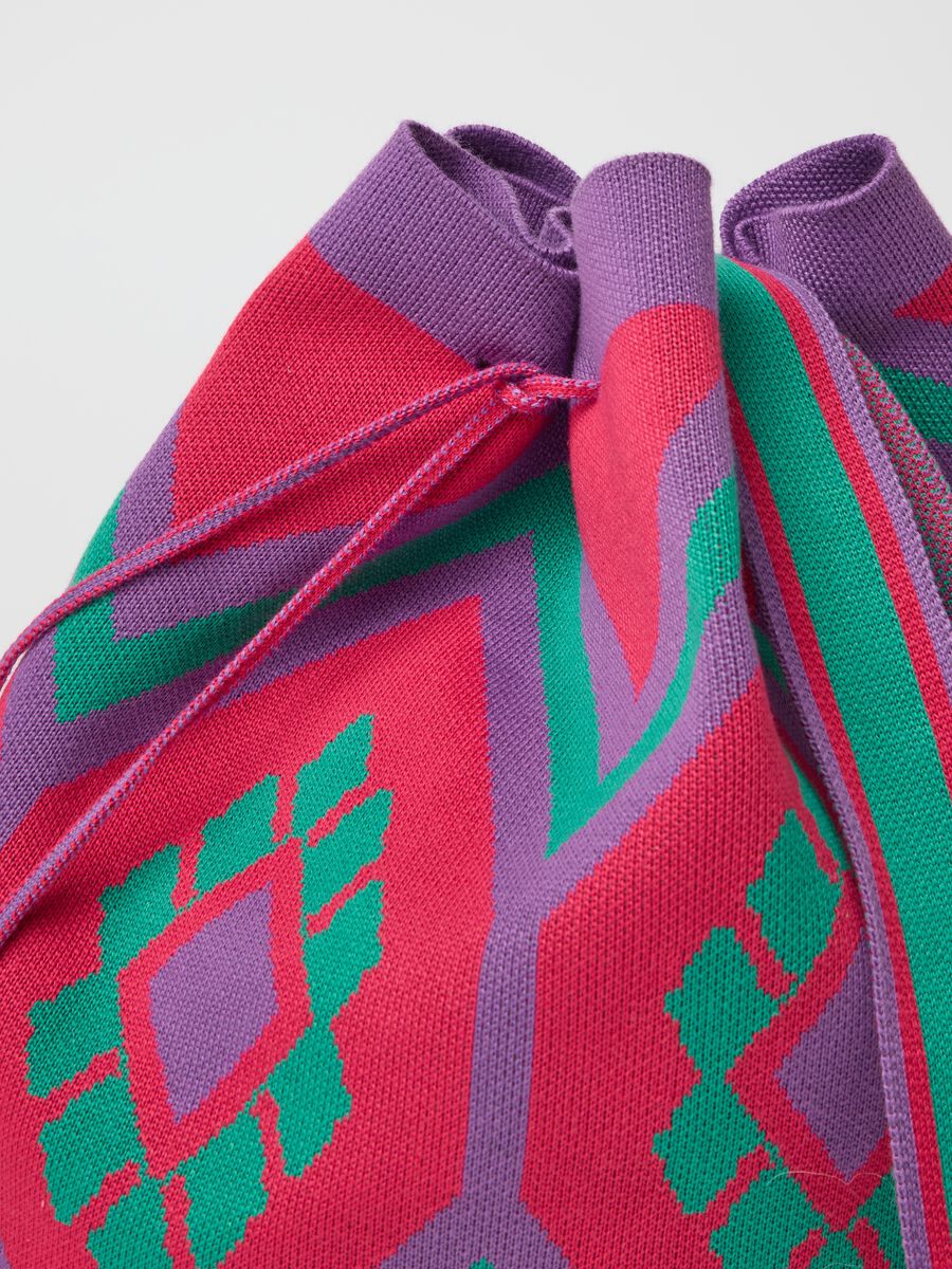 Shoulder bag with geometric motif and tassels_1