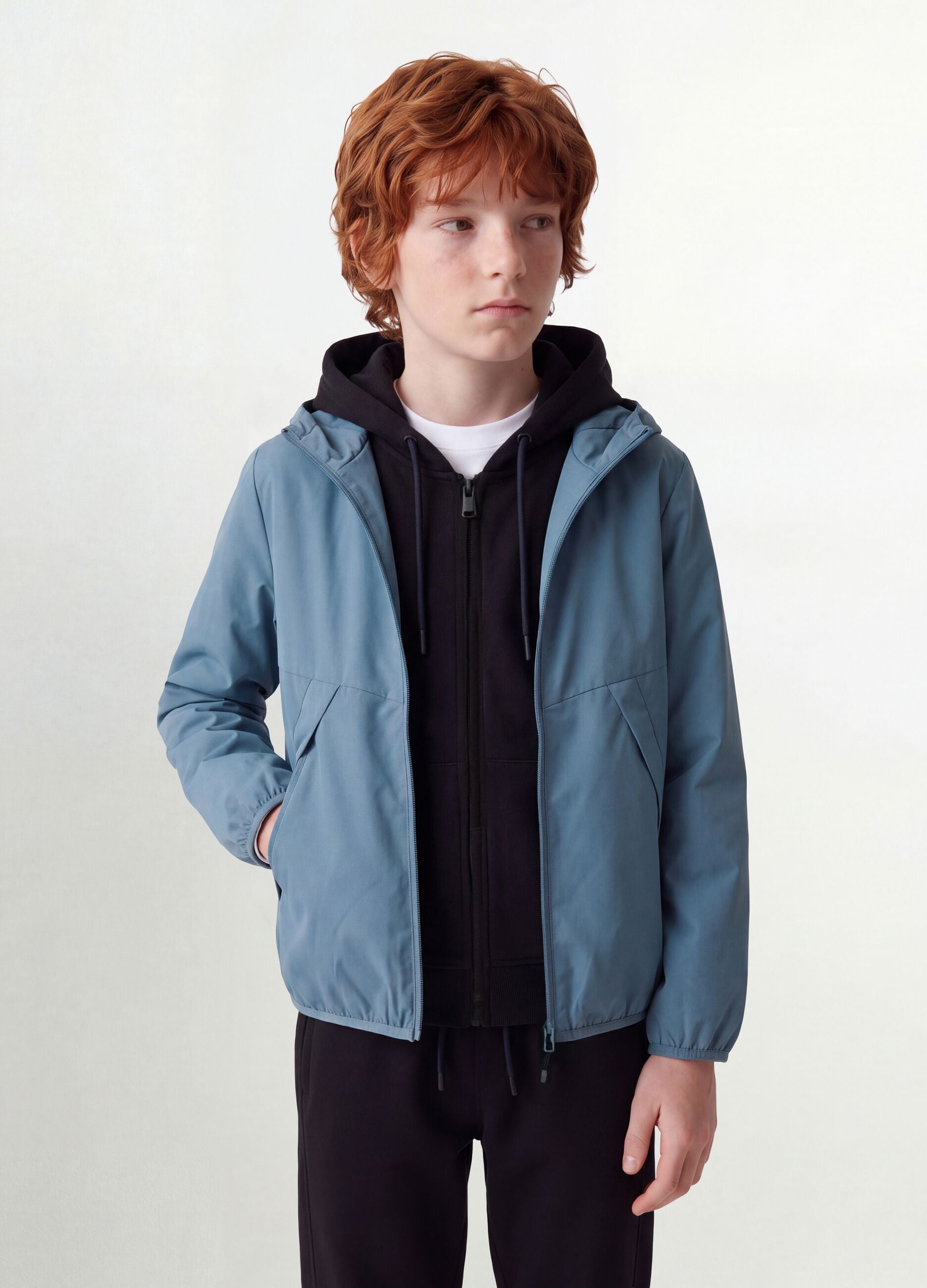 Blue oversized rain jacket with hood and zip for boys