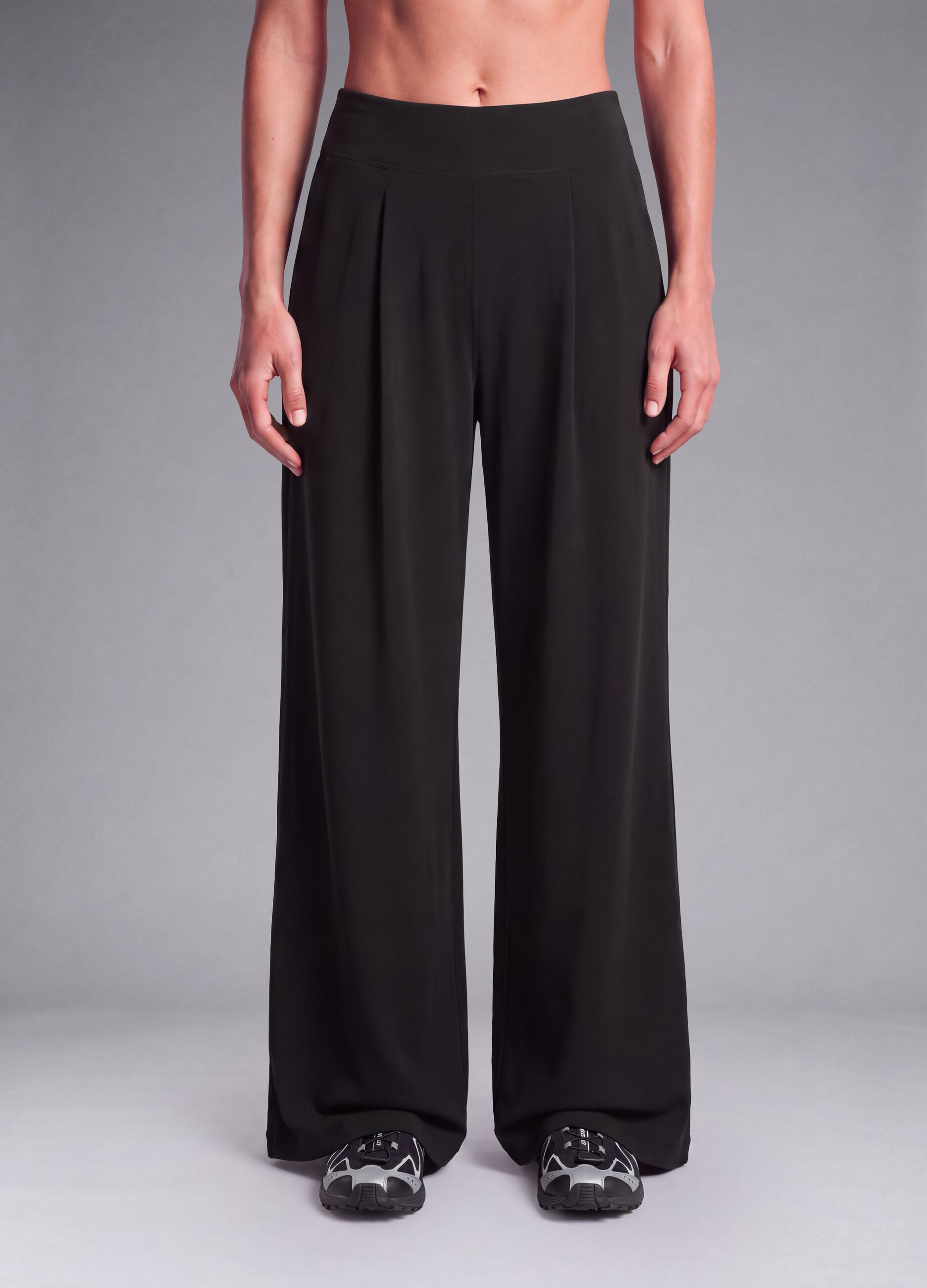 Black wide-leg stretch-fabric trousers