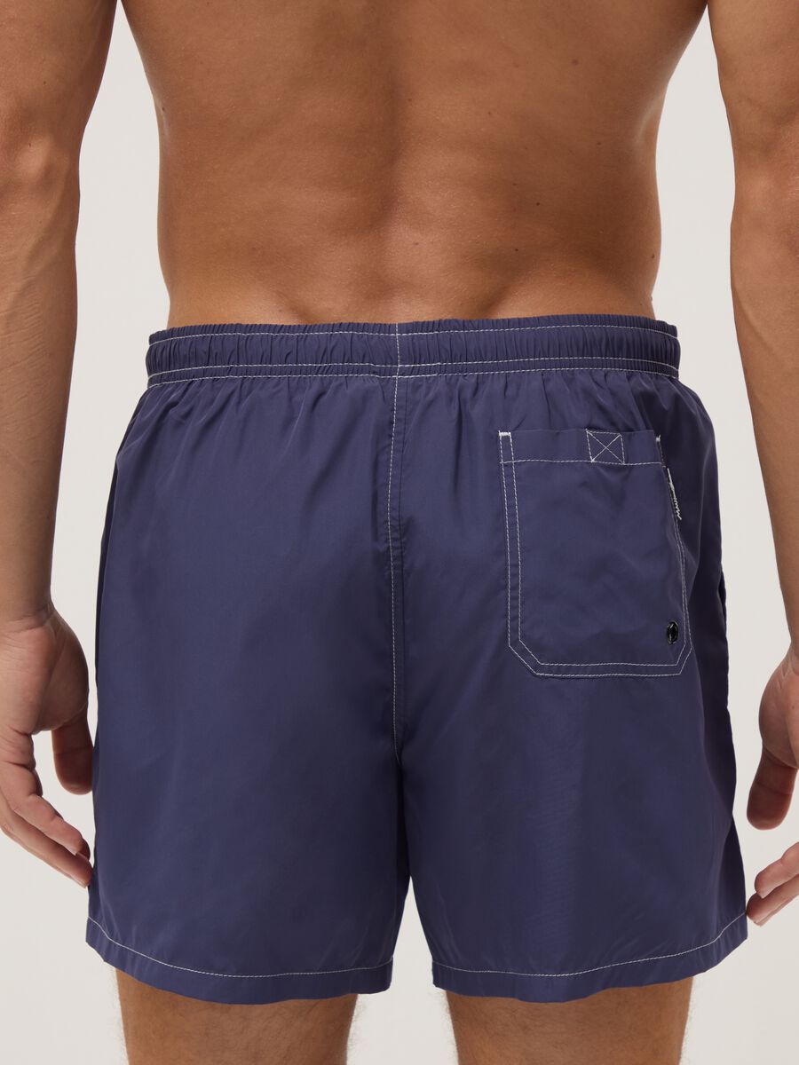 Blue swim shorts with drawstring waist_3