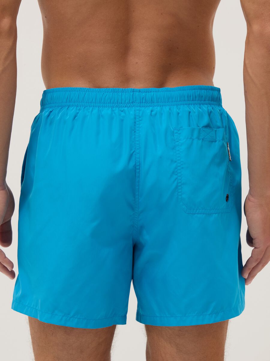 Blue swim shorts with elasticated waist and drawstring_3
