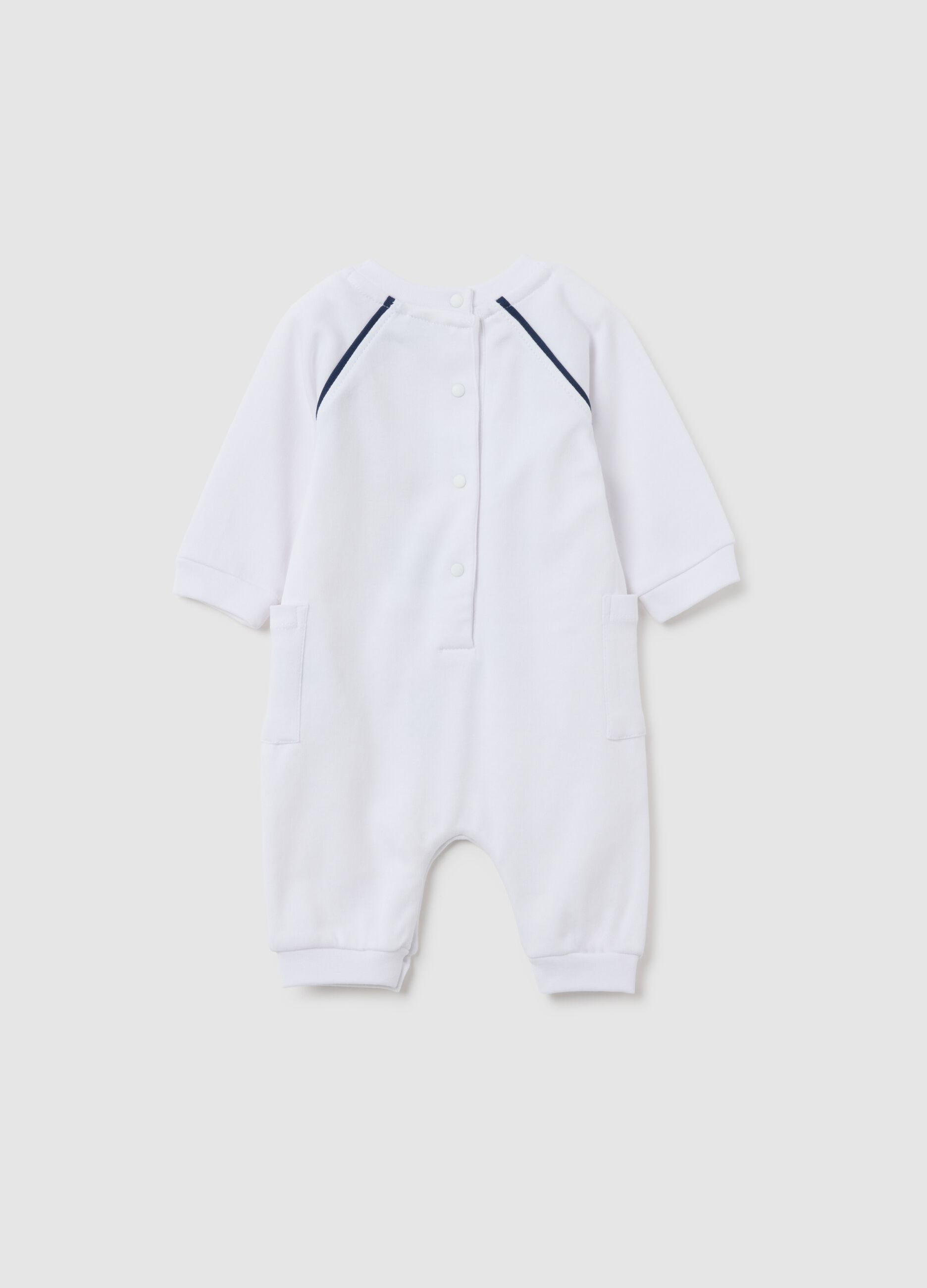 White baby romper in pure cotton with print