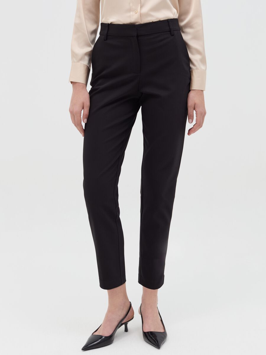 Chino trousers with pockets_1