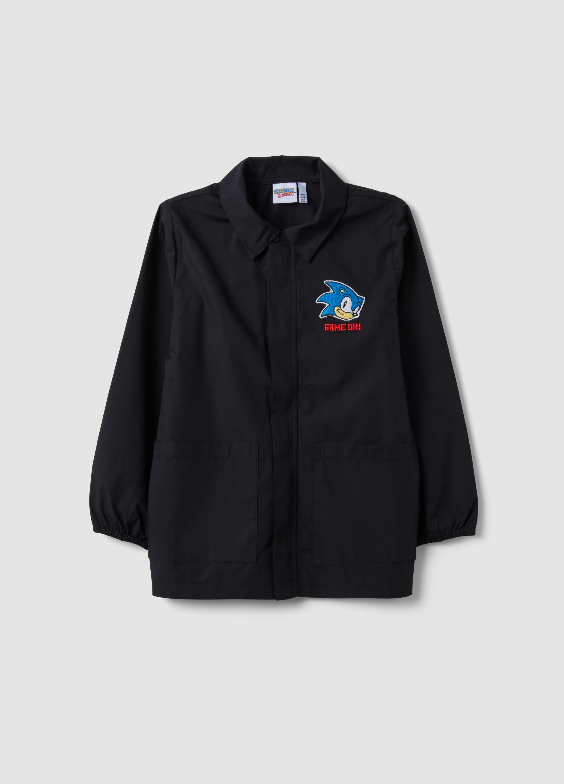 OVS KIDS, Grembiule Corto Per La Scuola Nero Con Zip E Ricamo Sonic Da Bambino, Nero, Taglia: 7-8