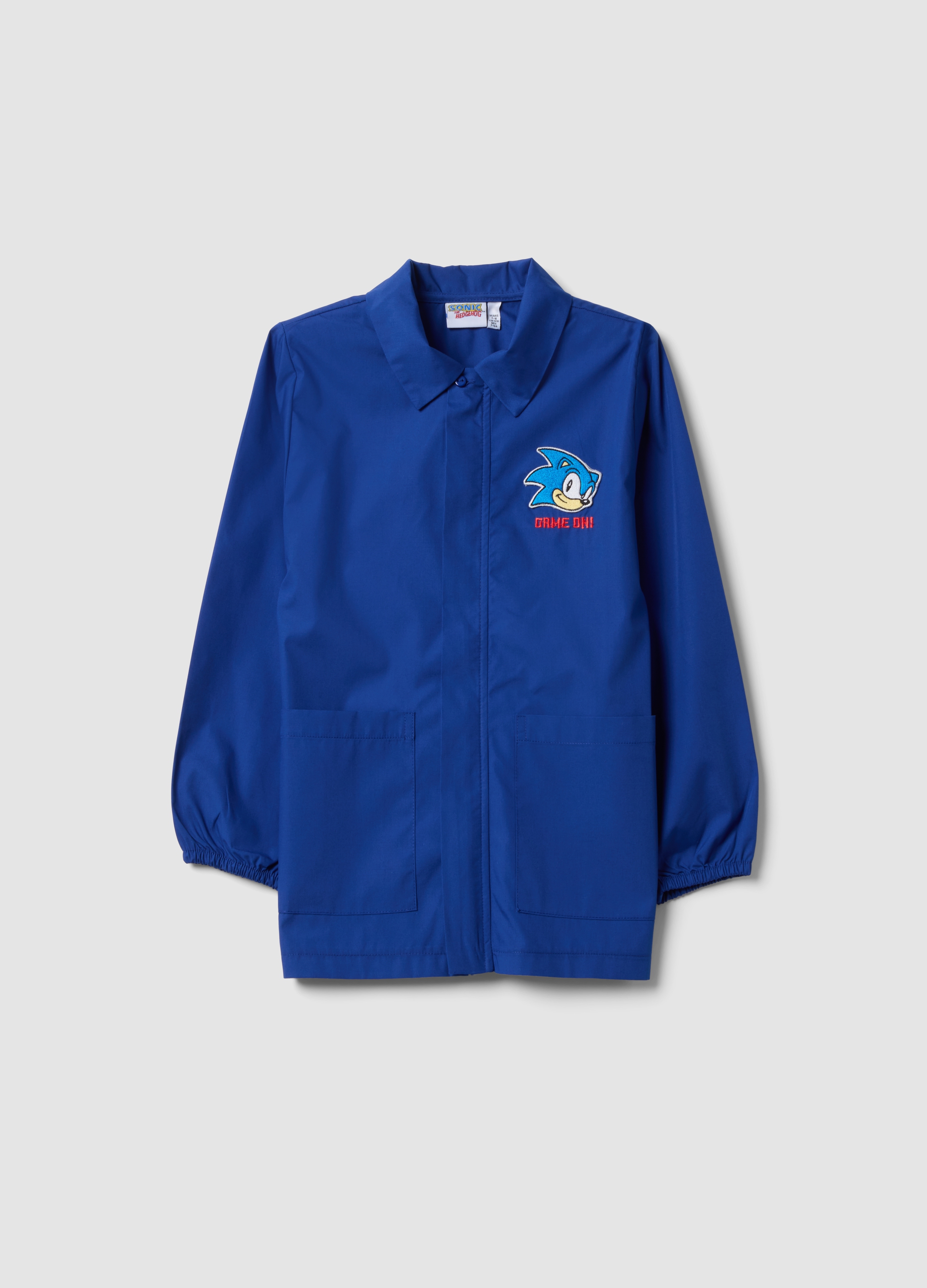 OVS KIDS, Grembiule Corto Per La Scuola Blu Con Zip E Ricamo Sonic Da Bambino, Blu, Taglia: 7-8